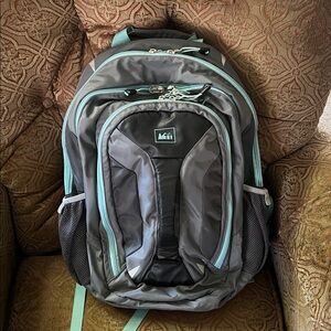 REI Co-Op Acumen backpack grey and aqua blue.
